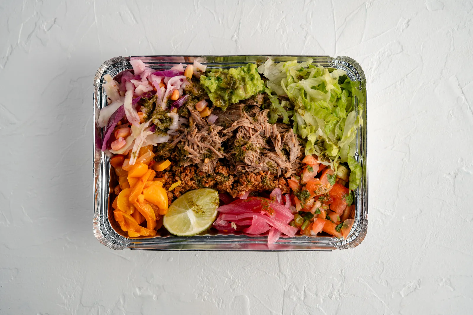 Fresh burritos on a rustic table